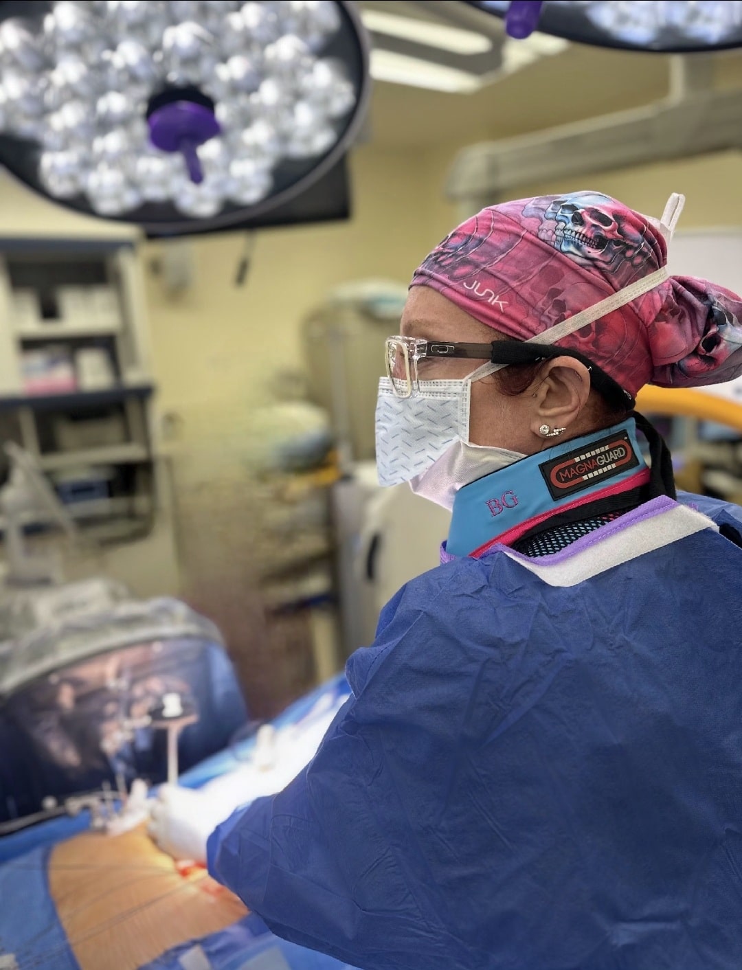 Dr. Betsy Grunch performing procedure in operating room.